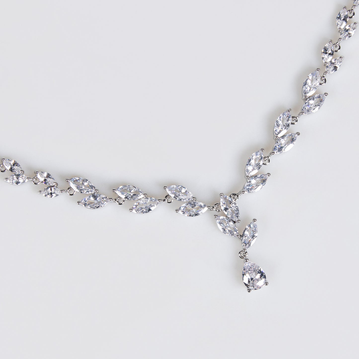 Elegant Rhodium-Plated Copper CZ Necklace & Earring Set with Teardrop Pendant and Floral Chain Detailing