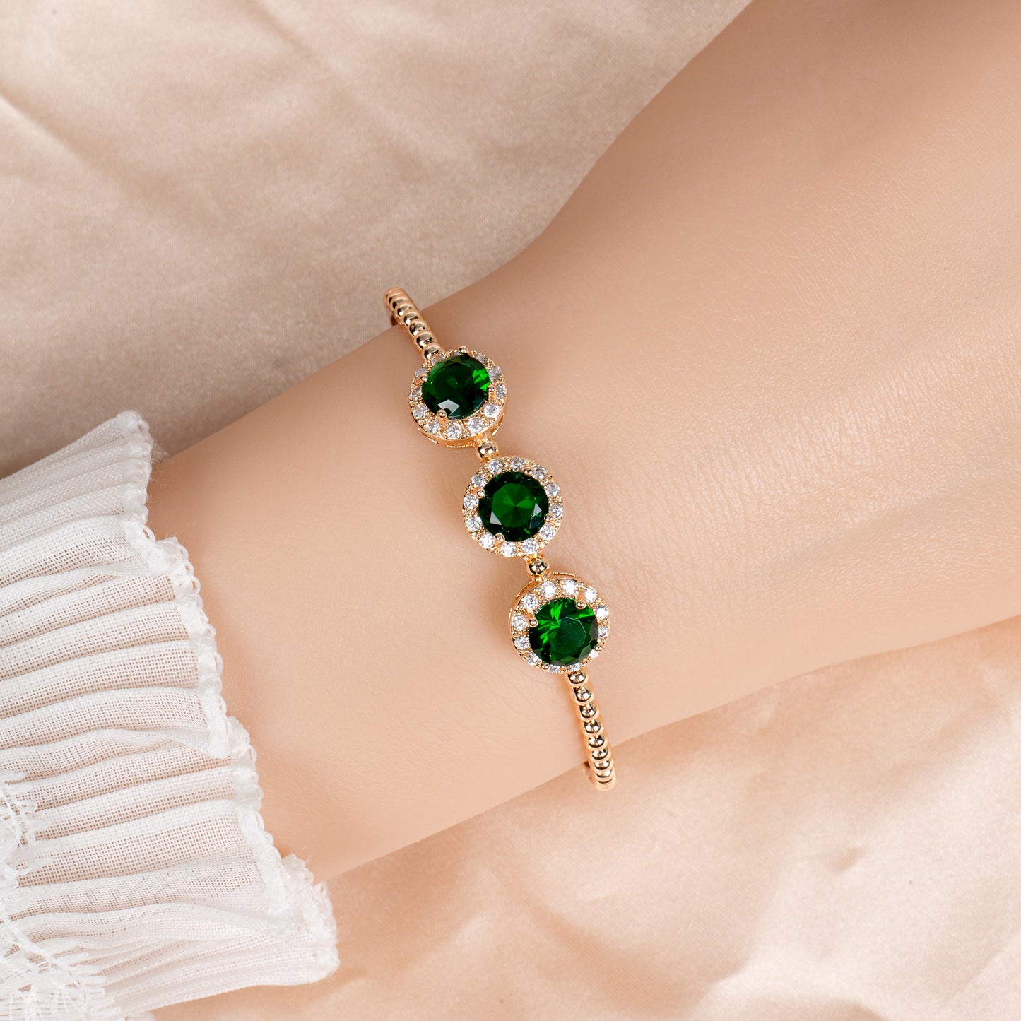 14K Golden Copper Beaded Bracelet with Green Gemstone Centers and Zircon Floral Halos for Elegant Daily Wear & Gift-Giving Occasions