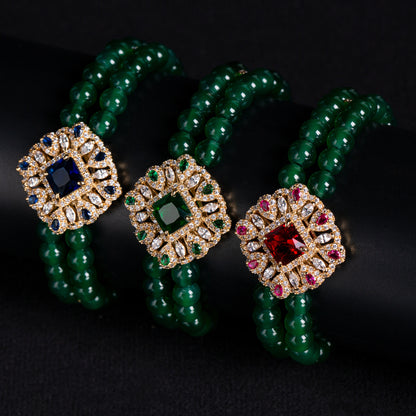 Double-Strand Green Gemstone Bracelet with Ornate Square Zircon Centerpiece & Gold-Tone Copper Clasp for Elegant Occasions & Statement Jewelry Lovers