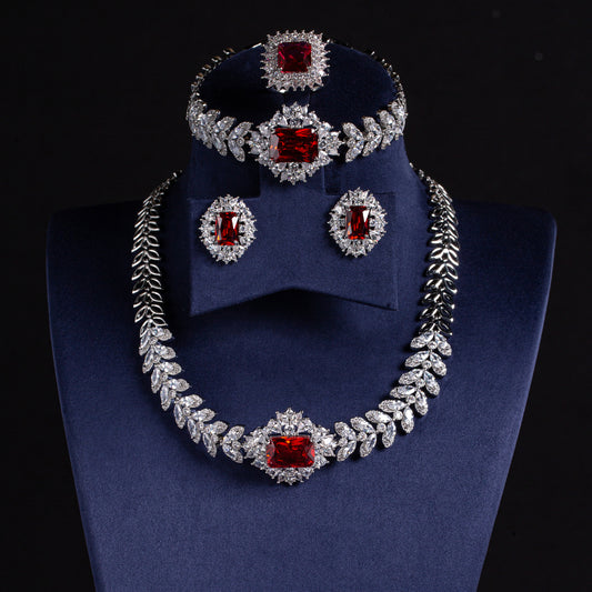 Elegant Rhodium-Plated Copper & CZ Jewelry Set with Emerald Green Zircon Accents and Leaf Motif Design