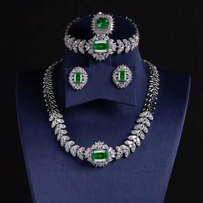 Elegant Rhodium-Plated Copper & CZ Jewelry Set with Emerald Green Zircon Accents and Leaf Motif Design