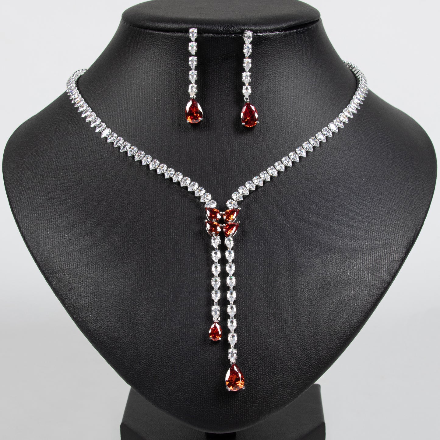 Elegant Rhodium-Plated Copper CZ Necklace & Earring Set with Pear-Shaped Green Gemstone Drops