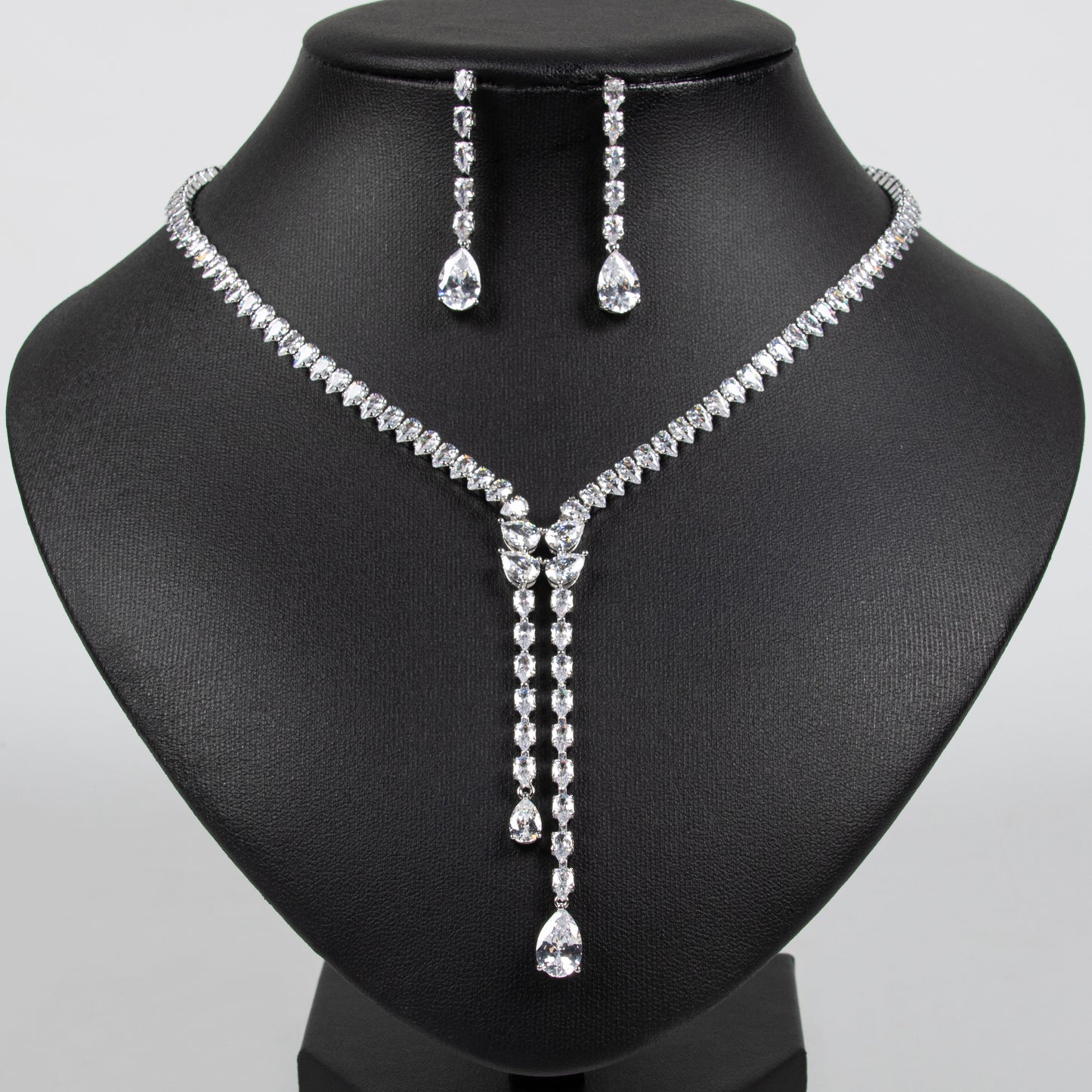 Elegant Rhodium-Plated Copper CZ Necklace & Earring Set with Pear-Shaped Green Gemstone Drops