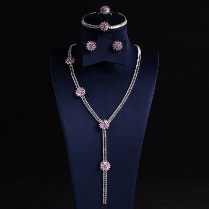 Elegant Rhodium-Plated Copper & CZ Jewelry Set with Emerald Green Accents and Floral Motifs