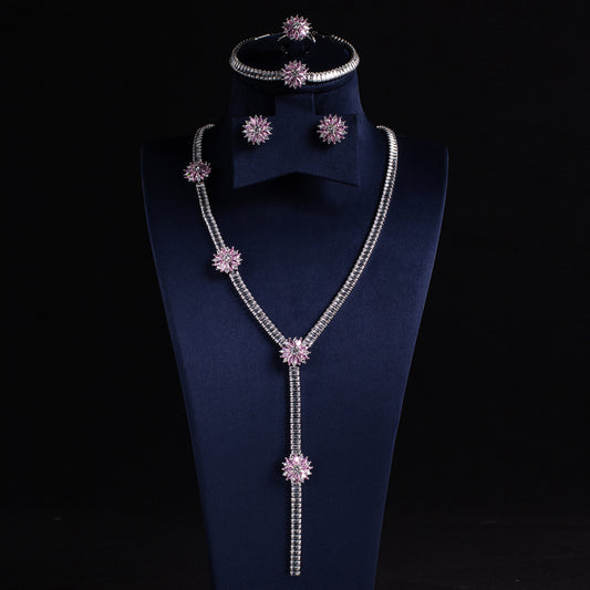 Elegant Rhodium-Plated Copper & CZ Jewelry Set with Emerald Green Accents and Floral Motifs