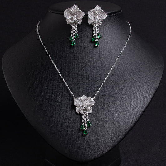 Elegant Rhodium-Plated Copper Floral Jewelry Set with Red Gemstone Accents and Micro-Pave Detailing