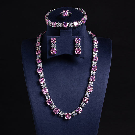 Elegant Rhodium-Plated Copper & CZ Jewelry Set with Emerald Green Zircon Accents and Diamond-Cut Detailing