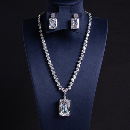 Elegant Rhodium-Plated Copper & Zircon Jewelry Set with Red Rectangular Gemstone Pendant and Matching Earrings